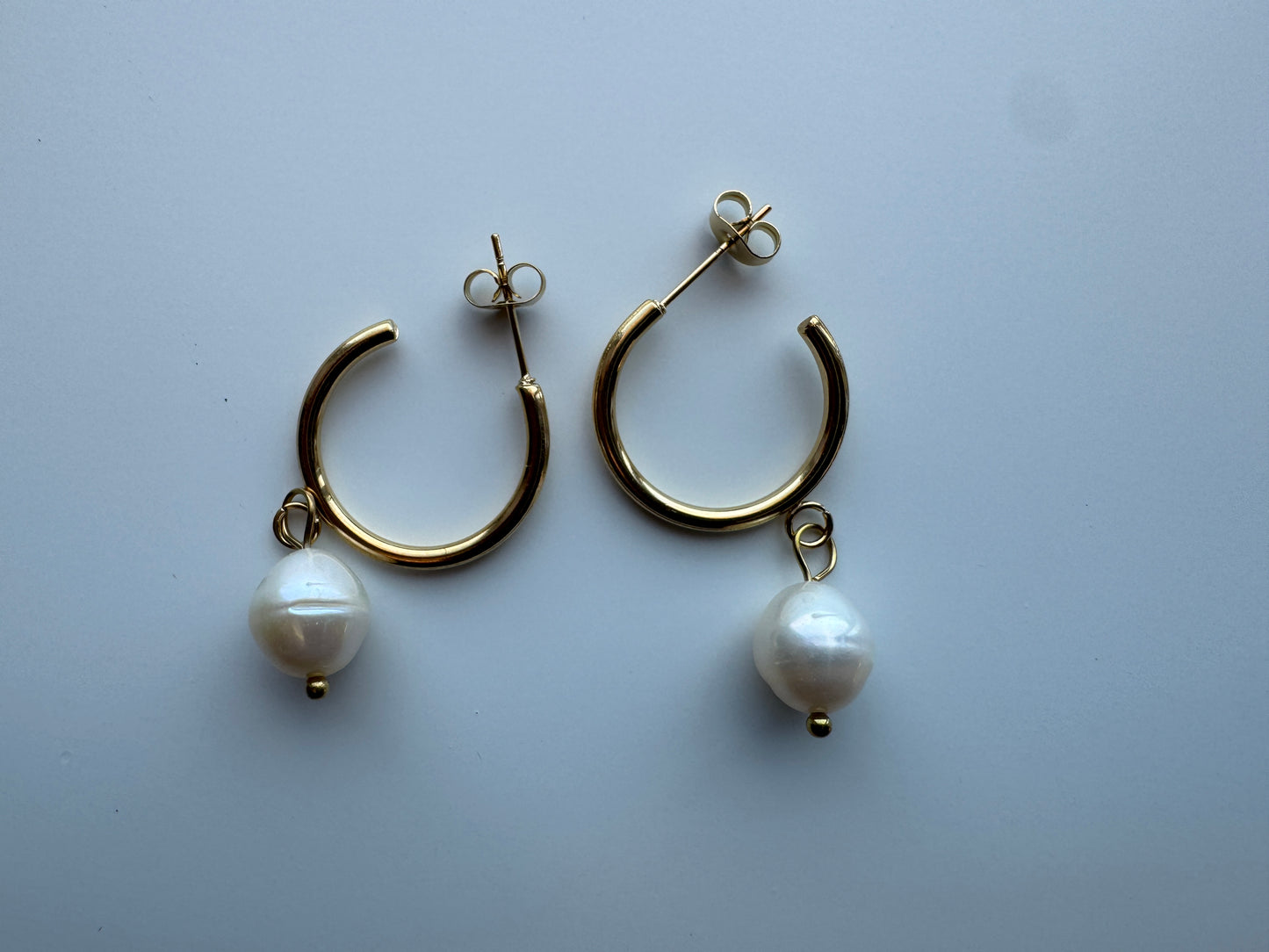 Pendientes de perlas de Lana