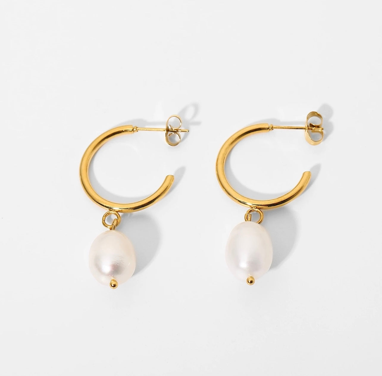 Pendientes de perlas de Lana