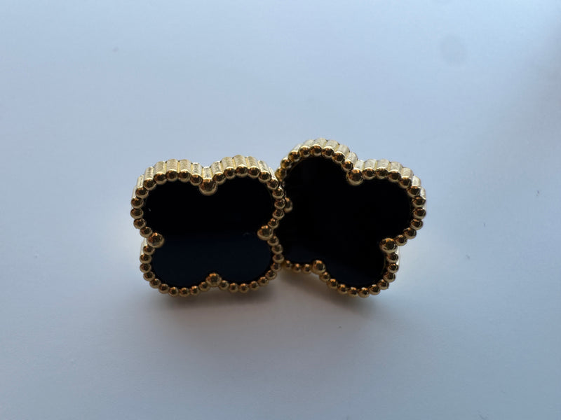 Clous d'oreilles en or avec trèfle à quatre feuilles